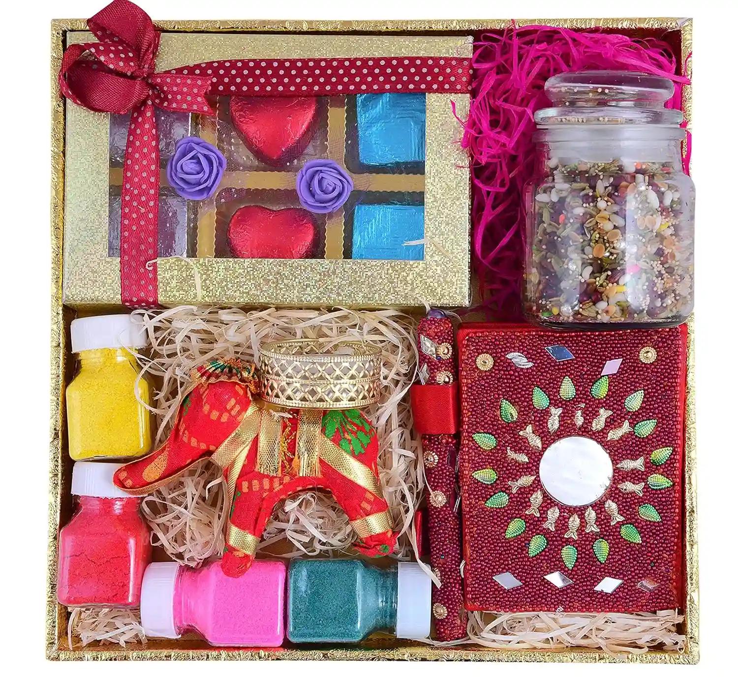 MANTOUSS Diwali Chocolate Gift Pack-1 Designer Tray+1 Handmade Chocolate Box+1 Rajasthani Diary & Pen+1 jar of Chocolate mukhwas(100gms)+1 Elephant Candle tealight Stand+Rangoli Colours+Greeting Card