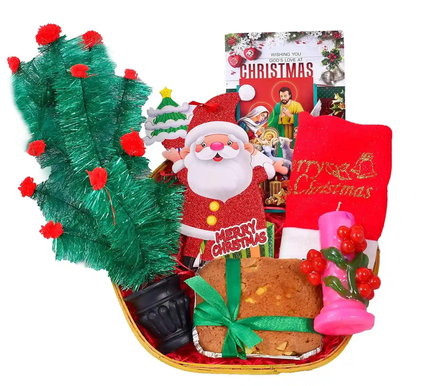 Christmas Cake Gift Hamper/Christmas Gift for Kids/Christmas Gifts-Decorated Basket+150gms Cake+Christmas Tree+Christmas Decorative hangings+Santa Claus Cap+Cherry Tree Candle+Christmas greeting Card